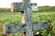 Old Orthodox cross with coin inserted in wood.  St. George Island, Pribilof.