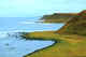 Long shore line of sand, rocks, and capes. Bering Island. Commanders.