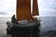 Aleut fisherman.  Boat has no motor, only hand made sails.  Bering Island, 1994.
